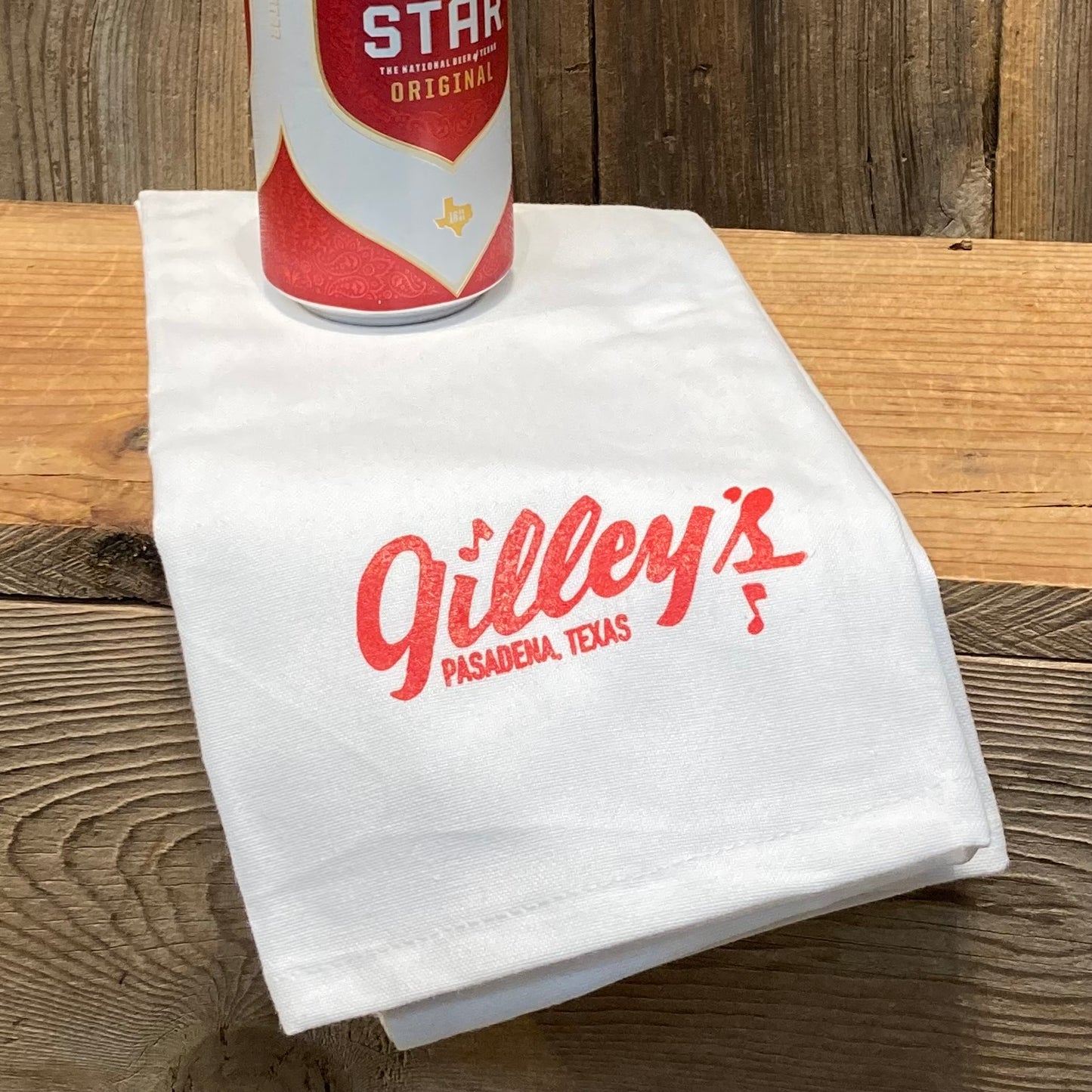 White hand towel featuring the classic Gilley's Pasadena, Texas logo in red.
officially licensed Gilley's merchandise, printed in Texas.
Red screenprint, 100% cotton. 29" x17"