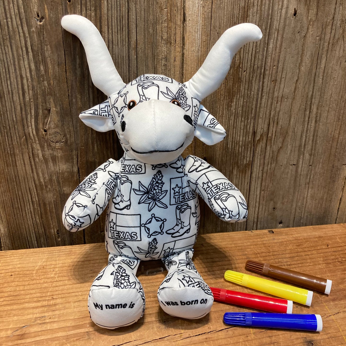plush longhorn featuring Texas designs ready to be colored!
11" tall white longhorn stuffed animal. Hooves have a place to add a name and the date born. includes 4 washable markers.