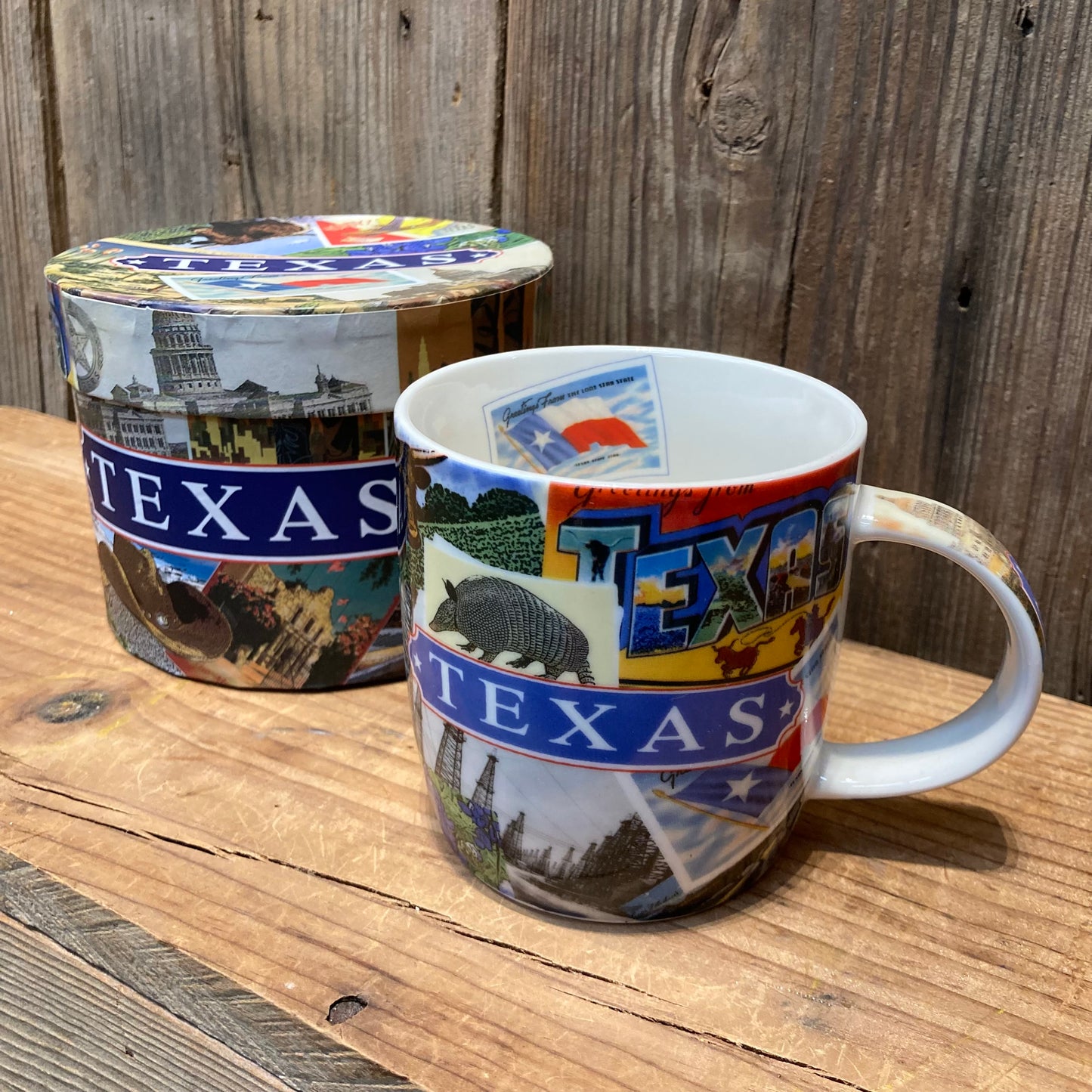 Texas Postcard Mug featuring colorful travel stickers and Texas landmarks and icons. A great souvenir of the Lone Star state!
Packaged in matching printed paperboard box. 13 oz. Porcelain. Dishwasher safe
