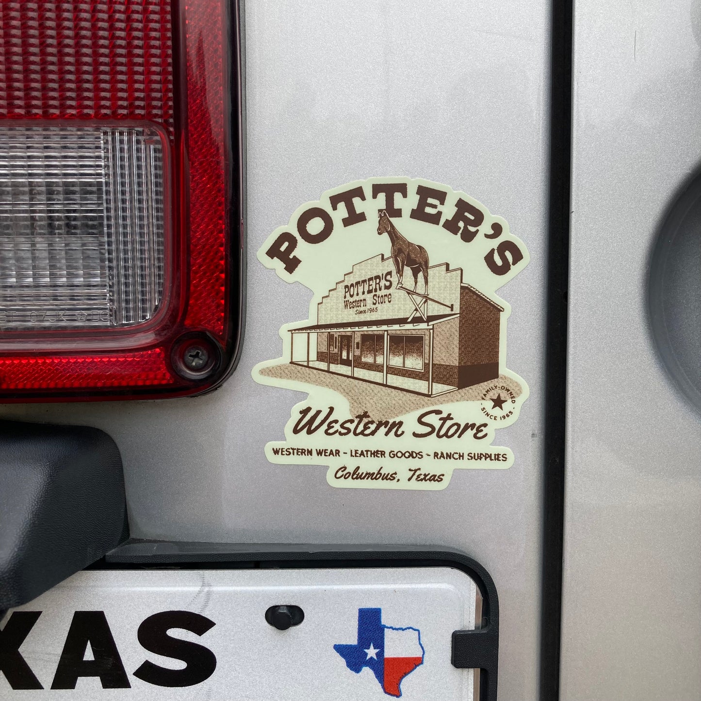 Potter's Stickers
Slap one on your truck, your Jeep, your RV, ...suitcase, laptop.
NEW die cut sticker featuring the Store and iconic horse. White background with store front and writing in brown. Potter's Western Store Western wear-leather goods-ranch supplies Columbus, TX. Family owned and operated since 1965
Vinyl. Aprox. 3.5" x 4"