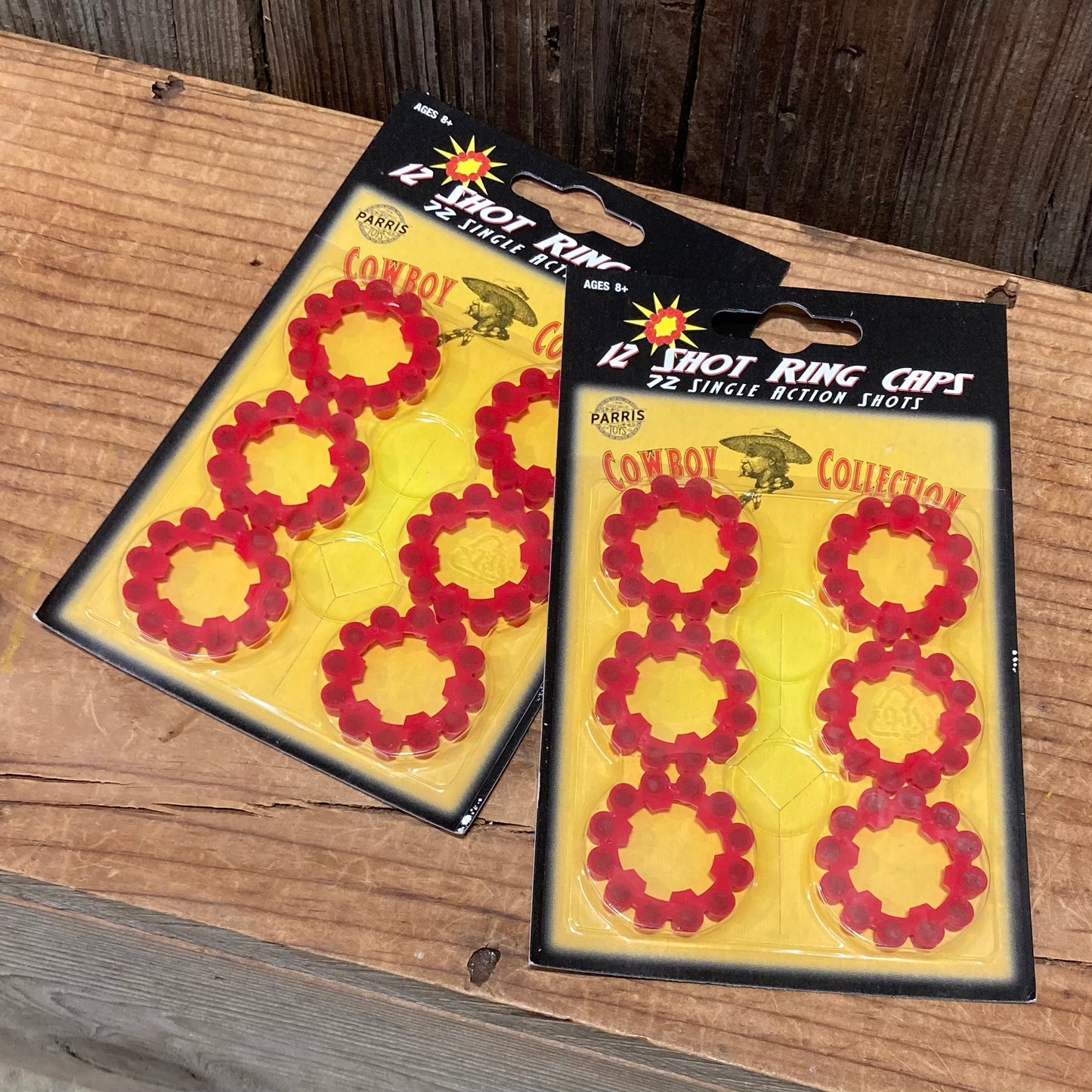 two packs of red 12-shot ring caps for toy cowboy pistols with 6 rings per pack