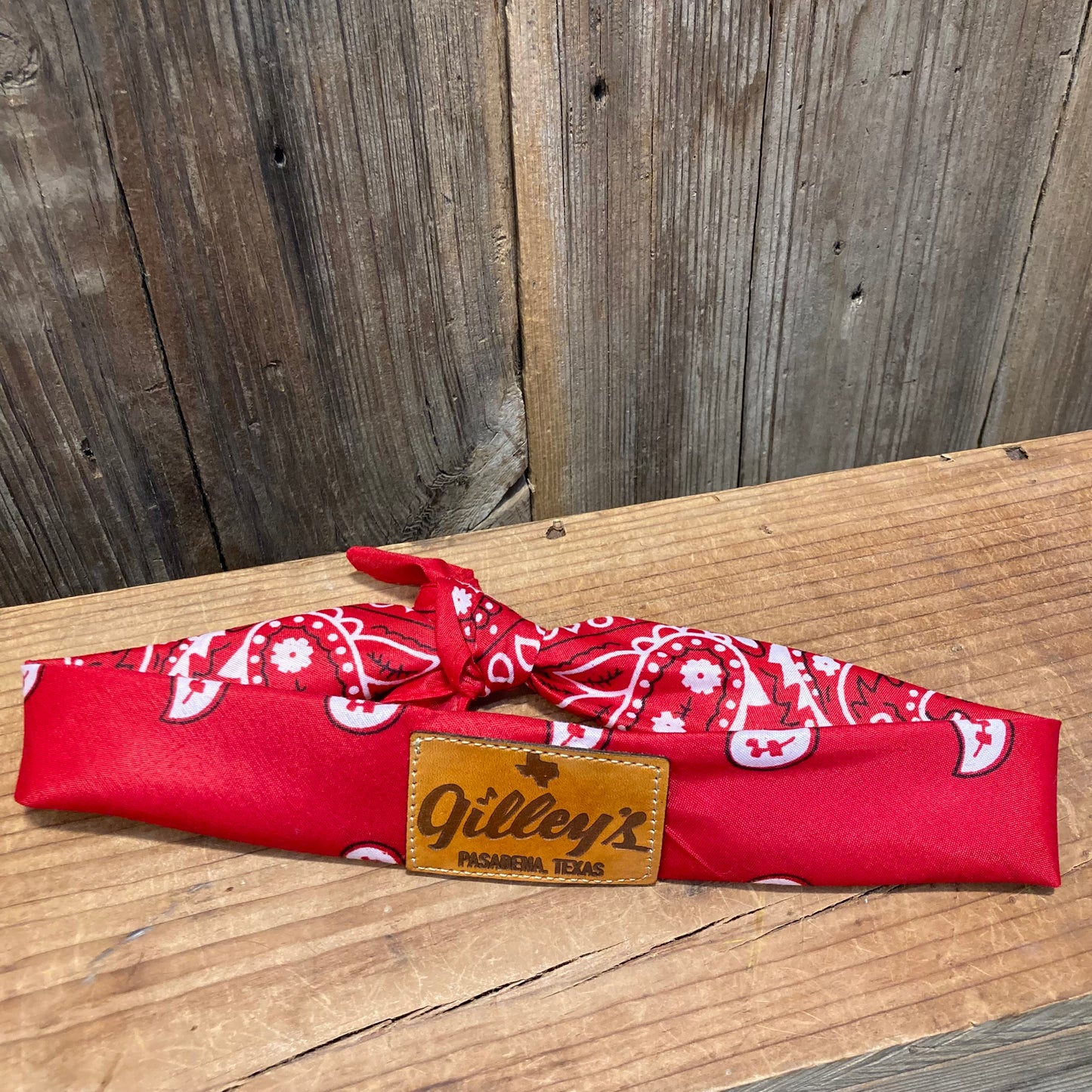 Classic red bandana with leather Gilley's logo patch.

officially licensed Gilley's merchandise, made in Texas.

Red, one size fits all.