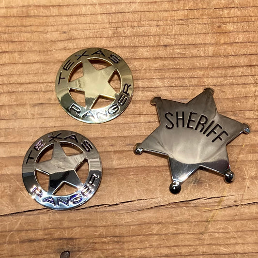 Sheriff and Texas Ranger western metal toy badges for cowboy and cowgirl dress-up play.