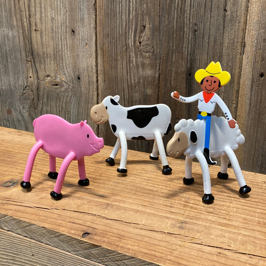 bendable farm animal toys including pig, cow, sheep and cowboy (sold separately)