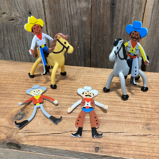 Bendable cowboy figures riding toy horses on a western ranch playset