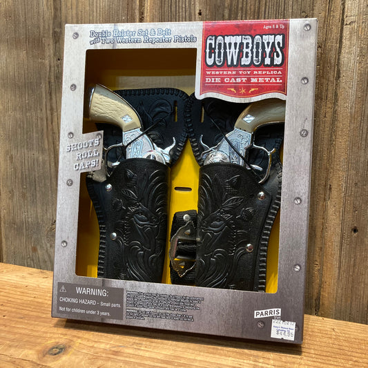 toy cap gun double holster set with two metal pistols and belt