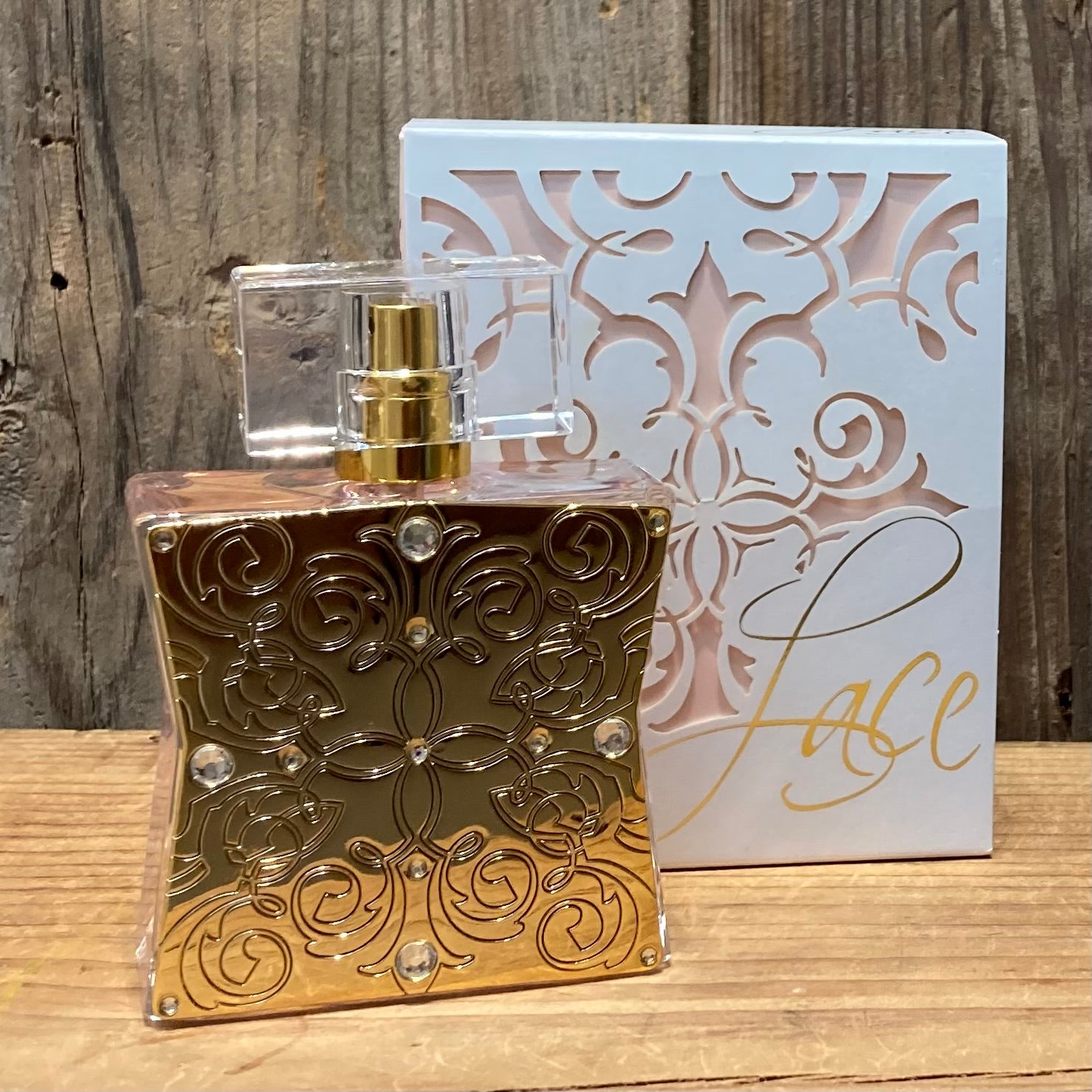  Lace Perfume Collection.

Lace in a white, embossed box.  Bottle is gold with embossed detail on the front.

Delicate and sophisticated.
A lovely and confident fragrance perfect for daytime wear

Scent Notes: citrus, feminine florals, precious woods, vanilla.

1.7oz/50ml