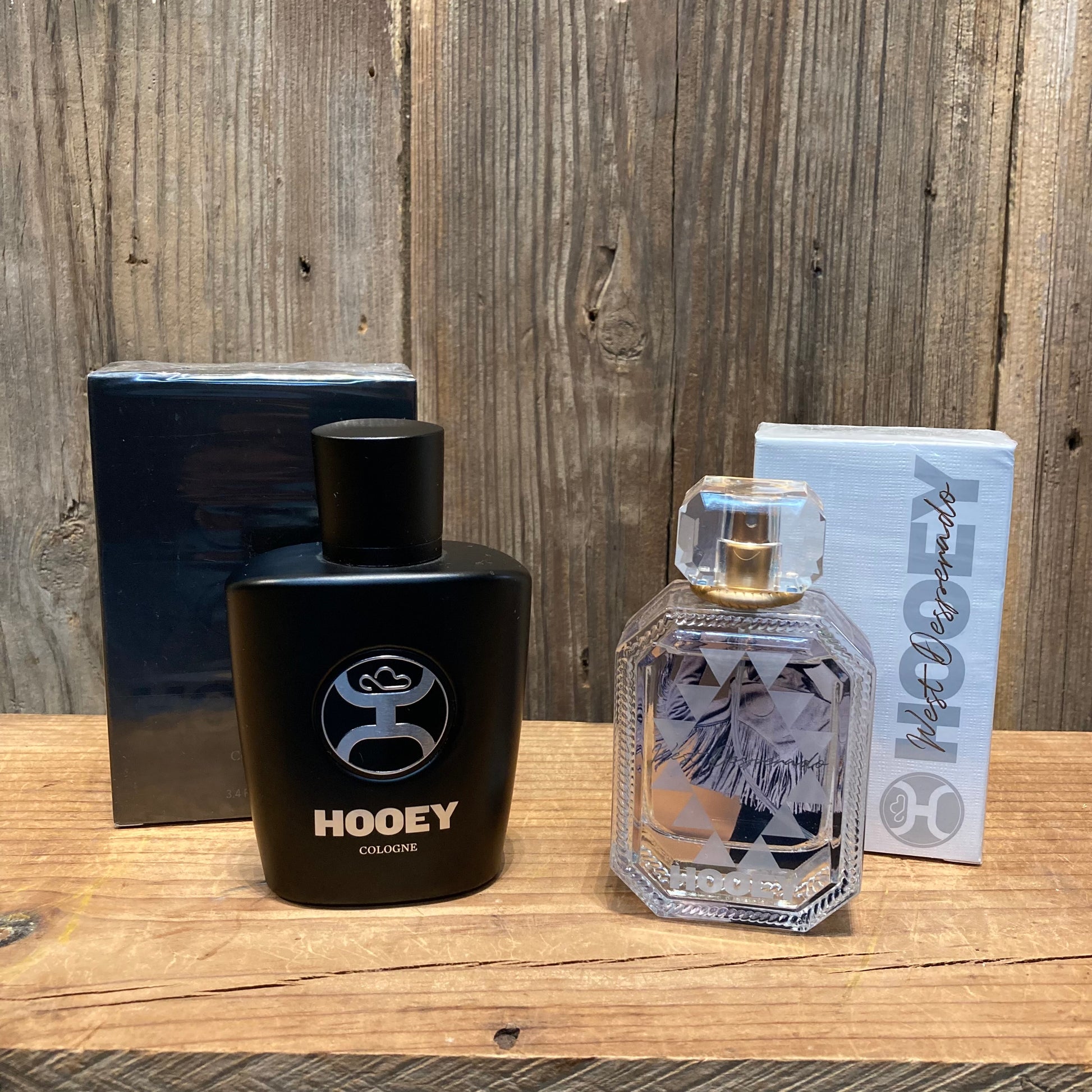 Hooey Men's cologne & Women's Perfume

Hooey Mens Cologne

3.4oz/100ml

Scent Notes: top - bergamot, lemon oil, pink pepper / heart - sage, leather, cocoa / base - sandalwood, amber, musk

Ladies West Desperado by Hooey Perfume

1.7oz/50ml

Scent Notes:  top - jasmine, saffron, pineapple / heart - evernyl, orris / base - cedarwood, vetiver, amber